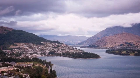 Queenstown timelapse at sunset with Moon, South Island New Zealand Lake Wakatipu Stock Footage