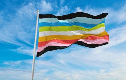 Queer pride flag waving in the wind at cloudy sky. Freedom and love concept.  Stock Illustration