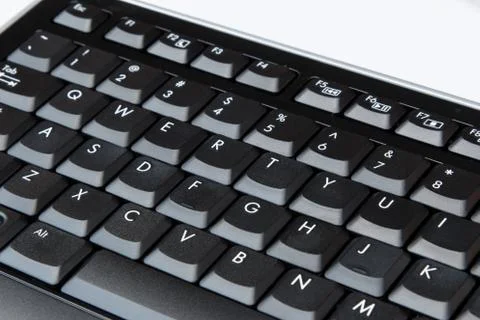 QUERTY keyboard black close up. Stock Photos