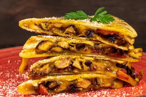 Quesadilla with Chicken Cheddar Cheese Red Pepper Close up Stock Photos