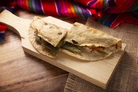 Quesadilla de Comal con queso y Nopales. Typical Mexican quesadilla made on a Stock Photos