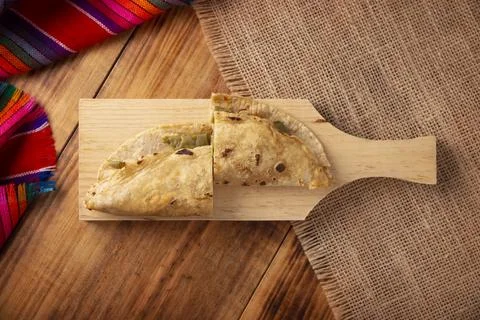 Quesadilla de Comal con queso y Nopales. Typical Mexican quesadilla made on a Stock Photos