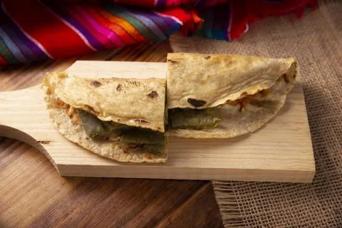 Quesadilla de Comal con queso y Nopales. Typical Mexican quesadilla made on a Stock Photos