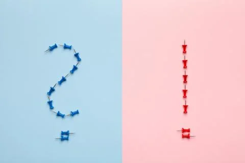 Question and Exclamation Marks on Pastel Background Stock Photos