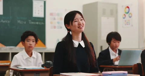 Question, answer and Asian child in classroom with answer for test, quiz and 스톡 동영상 292870424