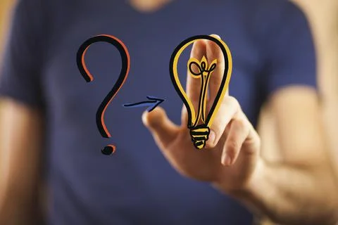 Question mark and bulb Stock Photos