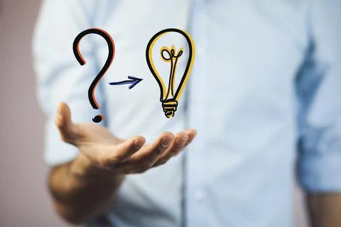 Question mark and bulb Stock Photos
