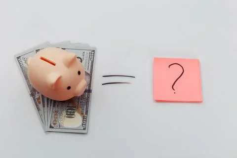 Question mark and dollar banknotes with piggy bank Stock Photos