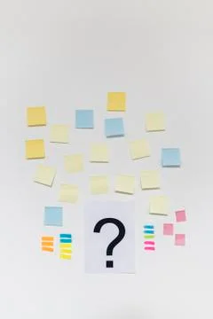 Question mark and post it on white background Stock Photos