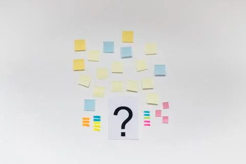 Question mark and post it on white background Stock Photos