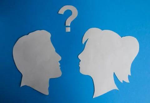 Question Mark Between Male and Female Silhouettes Foto stock