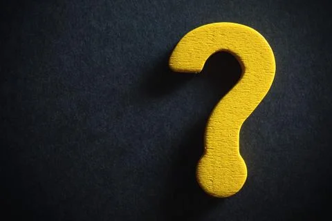 Question Mark on black Stock Photos