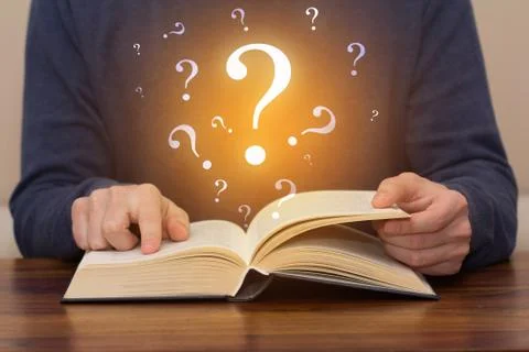 Question mark book Stock Photos