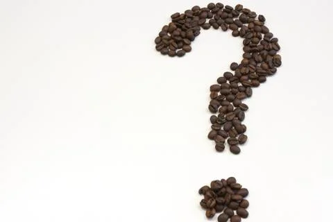 Question mark of coffee beans close up isolated on white . copy space. coffee Stock Photos
