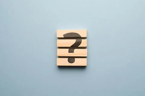 Question mark concept or FAQ. Sign on wooden blocks Stock Photos