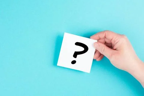 Question mark in the hand, looking for an answer, searching for knowledge,... Stock Photos