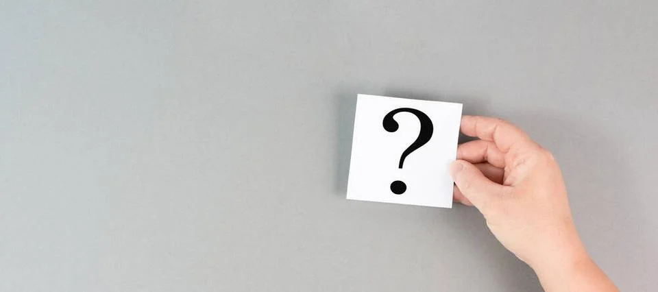 Question mark in the hand, looking for an answer, searching for knowledge,... Stock Photos