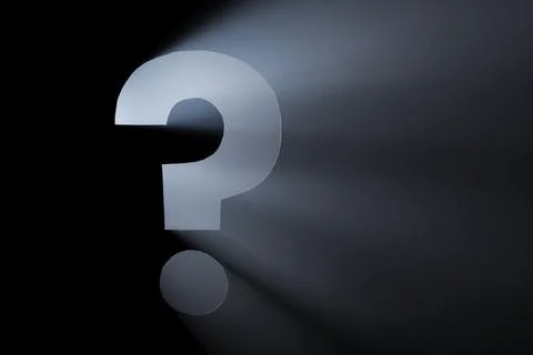 Question Mark. Hole cut in cardboard, smoke machine and spotlight. The image may Illustration