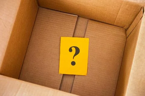 Question mark inside cardboard box Stock Photos