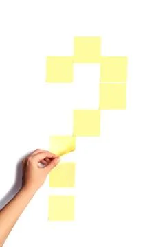 Question mark made with yellow empty sticky notes 库存照片
