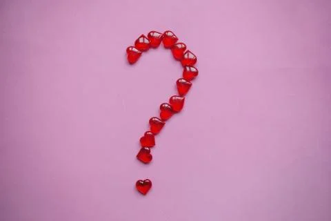 A question mark from many small red hearts. Foto stock