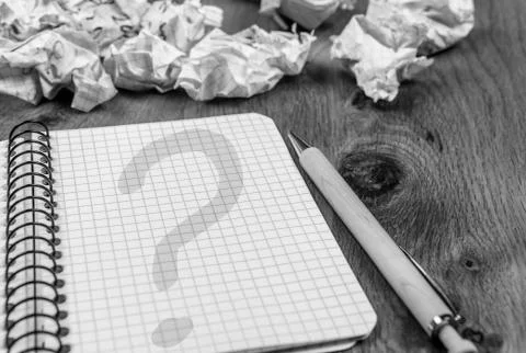 Question mark on notebook page Stock Photos