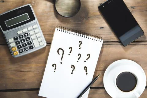 Question mark on notepad Stock Photos