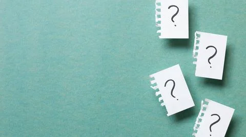 Question mark on ripped note on green background. Thinking, solution, busi... Stock Photos