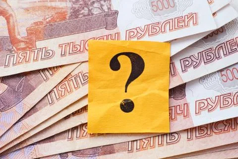 Question mark on Russian rubles. Stock Photos