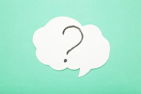 Question mark speech bubble on mint background. Stock Photos