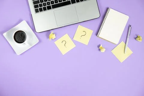 Question mark on sticky notes, notebook, cup coffee, phone, Stock Photos