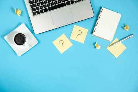 Question mark on sticky notes, notebook, cup coffee Stock Photos
