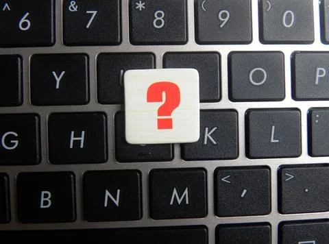 Question mark (?) symbol on keyboard background Stock Photos