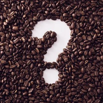 Question marked framed with roasted fresh coffee beans 스톡 사진