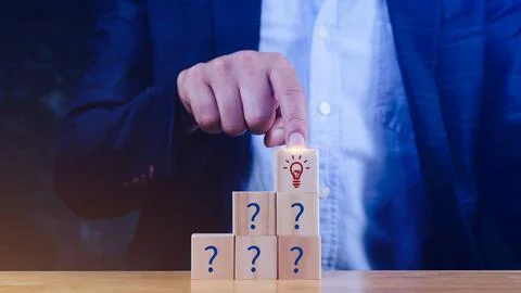 Question marks and light bulb symbolizing idea or solution, Problem solving.. 写真素材