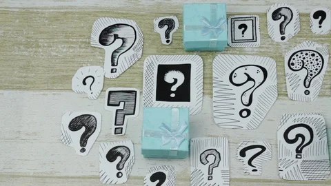 Question marks and turquoise gift boxes Stock Footage 90449278