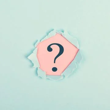 Question marks on pink colored torn paper, light blue background, looking ... Stock Photos