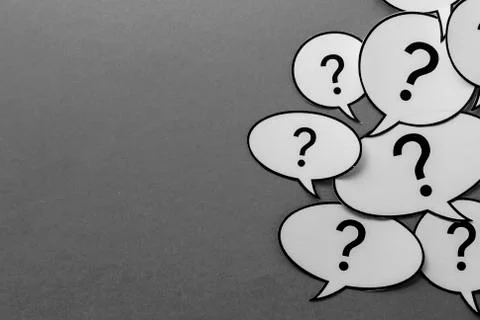 Question marks on speech bubbles side border Stock Photos