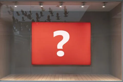 A question, a question mark on a red billboard Stock Photos