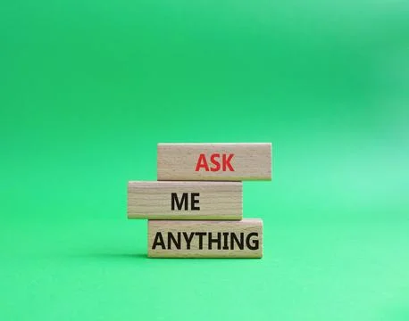 Question symbol. Concept words Ask me Anything on wooden blocks. Beautiful .. Stock Photos