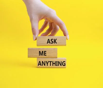 Question symbol. Concept words Ask me Anything on wooden blocks. Businessma.. Stock Photos