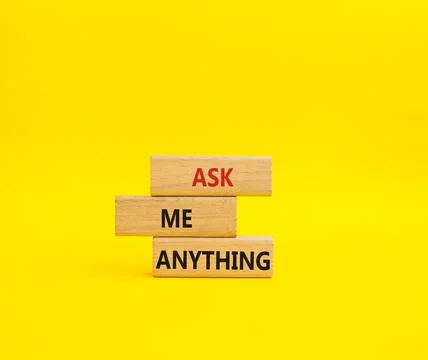 Question symbol. Concept words Ask me Anything on wooden blocks. Beautiful .. Stock Photos