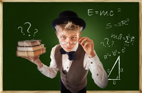 Questioning looking young man with old books Foto stock