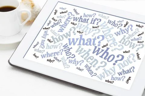 Questions word cloud on digital tablet who, what, when, where, why, how qu... Stock Photos
