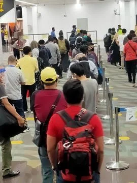 Queue at the airport Stock Photos