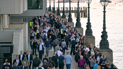 The Queue along the Thames riverbank to see The Queen laying in state Video stock 215945741