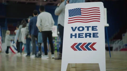 Queue of American citizens come to vote in polling station Stock Footage 273857035