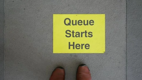 Queue begins marking at entrance during busy day Video stock 311090724