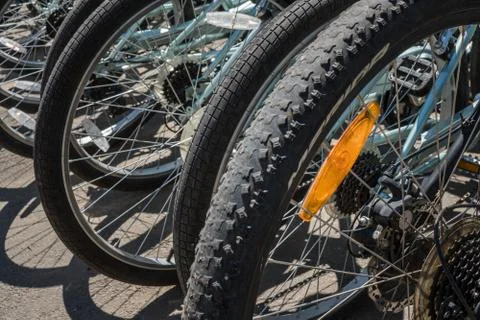 The queue of bicycles. Wheels of bicycles. texture. background Stock Photos