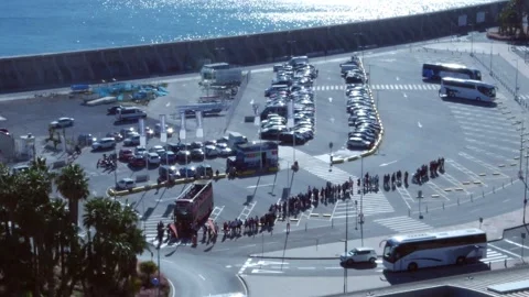 Queue to board a double decker tourist bus at Malaga's cruise terminal Video stock 258762191